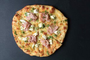 mortadella, pizza, pistachios, burrata,