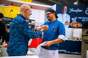 meeting people on the show floor at Pizza Expo