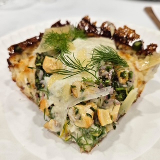 detroit style pizza with asparagus, a fennel onion and olive oil soubise, a gremolata of Meyer lemon, shallots, chives, fennel fronds, cashews and olive oil. Garnished with Parmesan and fennel fronds,LA-based DTown Pizzeria, Chef/Owner Ryan Ososky’s, Pizza Maker of the Year Championship, International Pizza Challenge, Pizza Expo, Las Vegas
