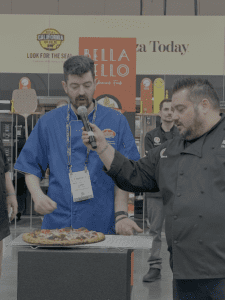 Chris Ostapenko of Slice on Broadway, Pittsburgh, Pennsylvania wins World's Best Cheese Slice at International Pizza Challenge at Pizza Expo in Las Vegas